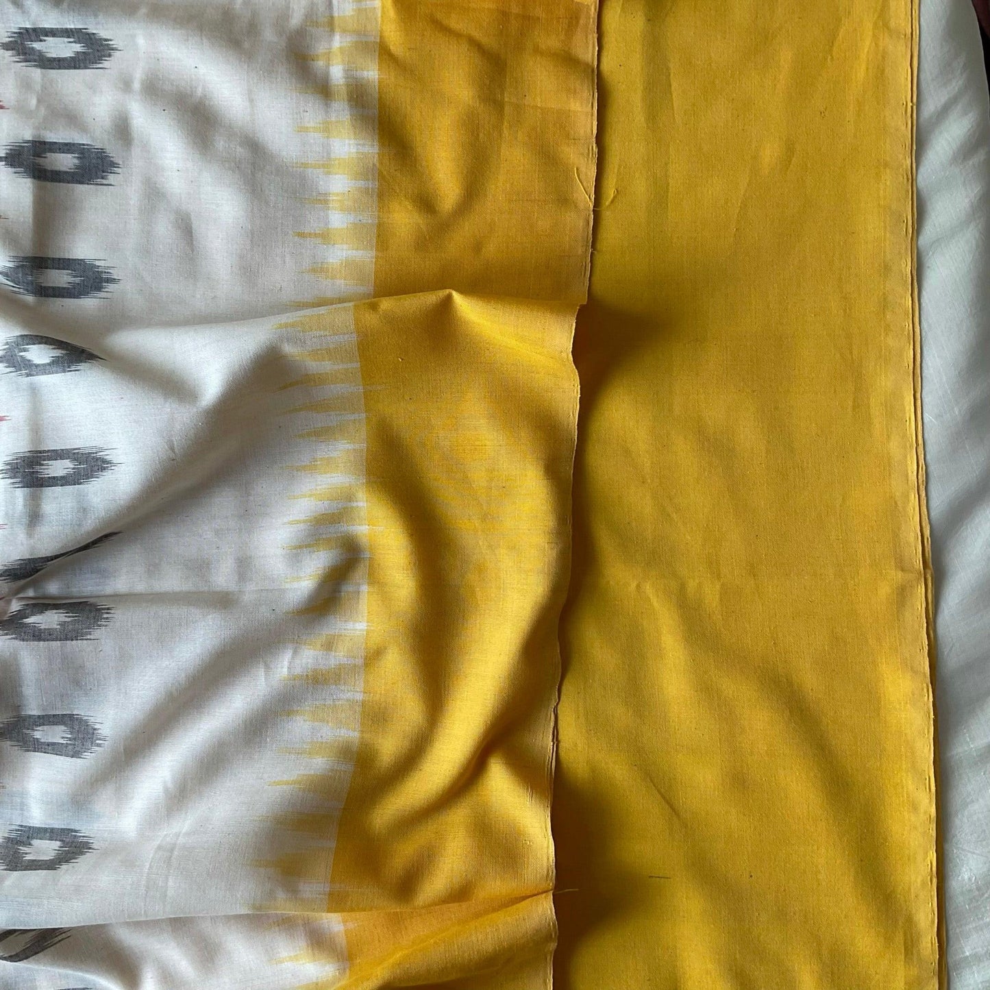 Traditional Ikkat handloom saree with intricate woven design