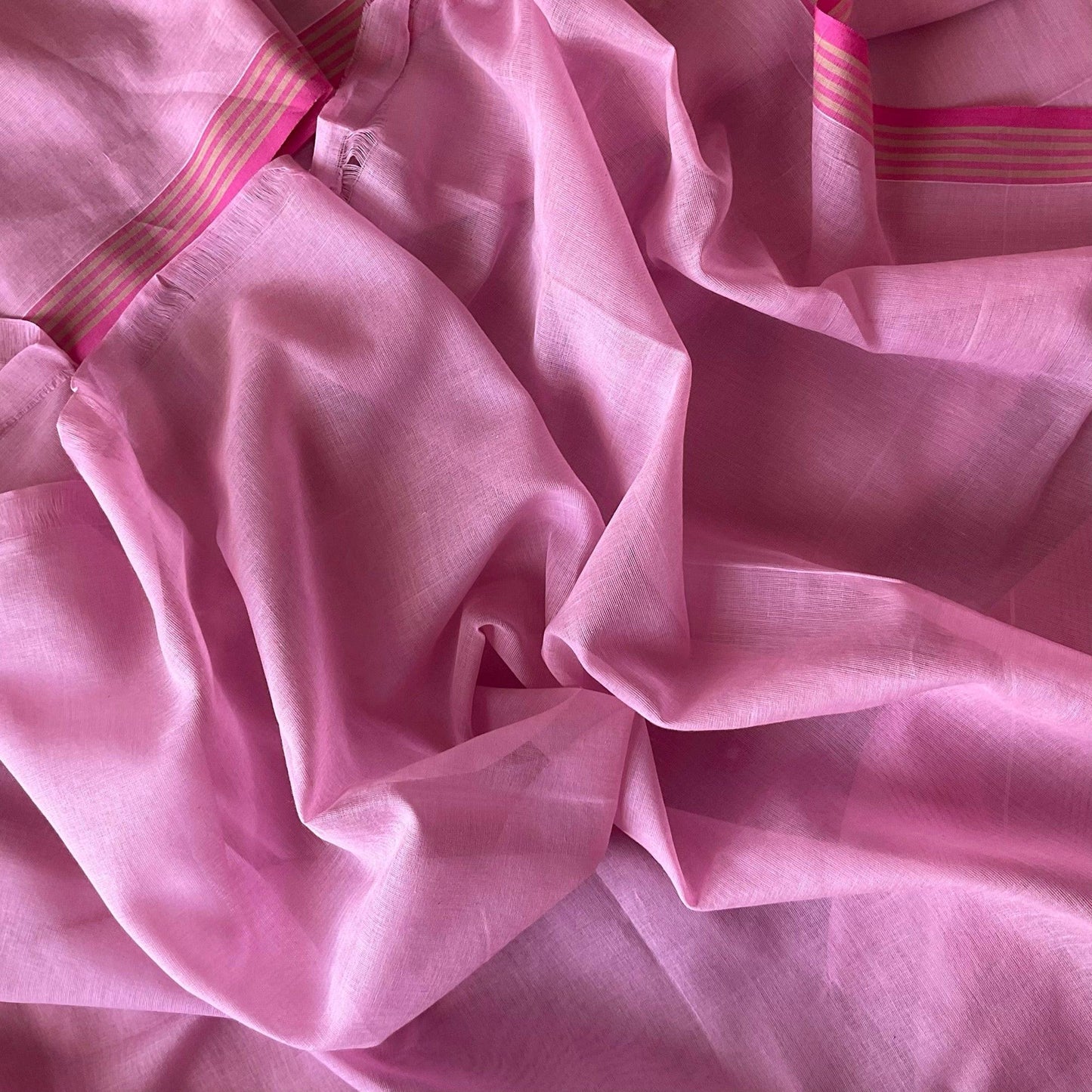 Handloom Pink cotton saree with with plain running blouse open look.