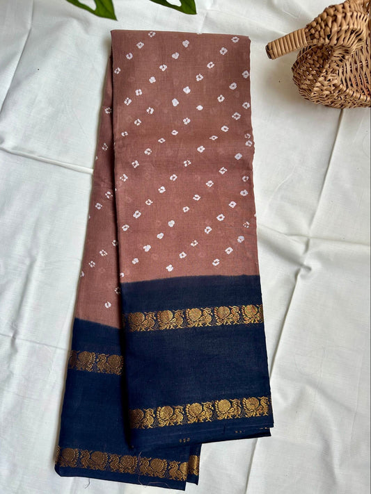 Light Brown saree with black border with Annam motif.