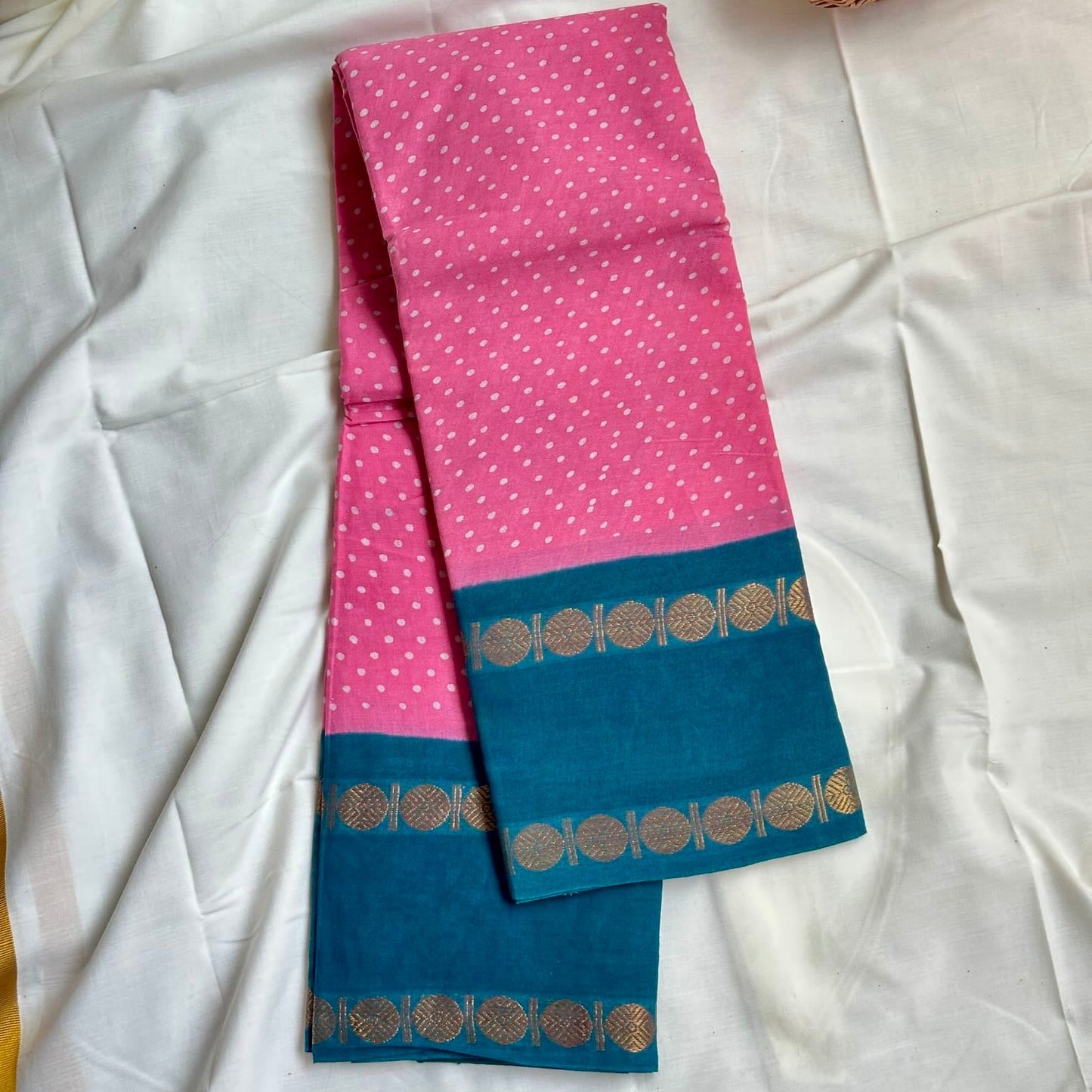 Pink sungudi cotton saree black printed with a Blue border and Rudraksha motif