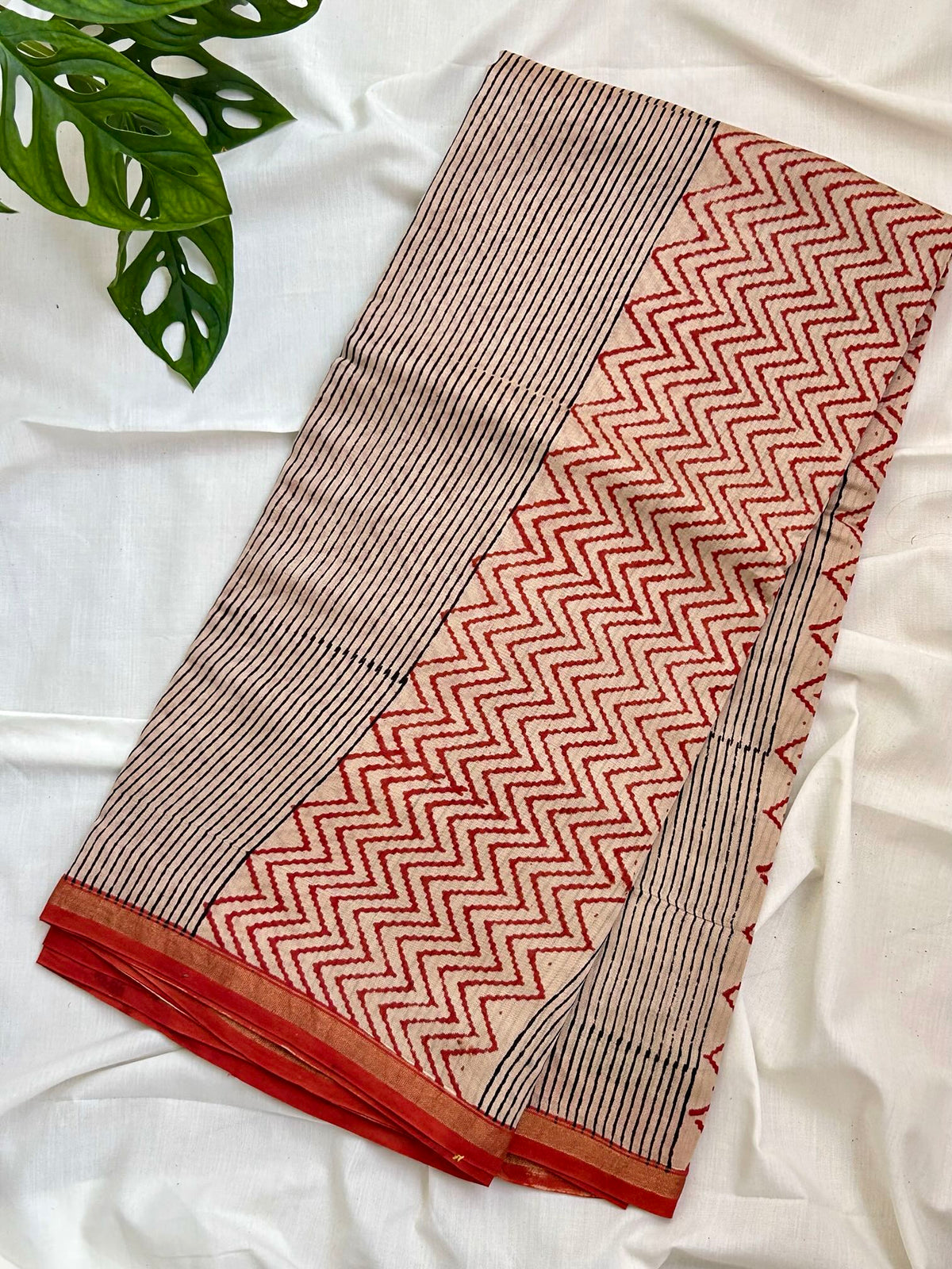 Red Chanderi Silk zigzag Saree, with. Thin Zari line border.