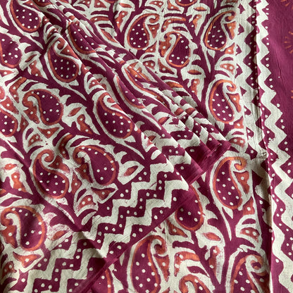 Mulmul Cotton handblock printed saree in maroon pleated close look.