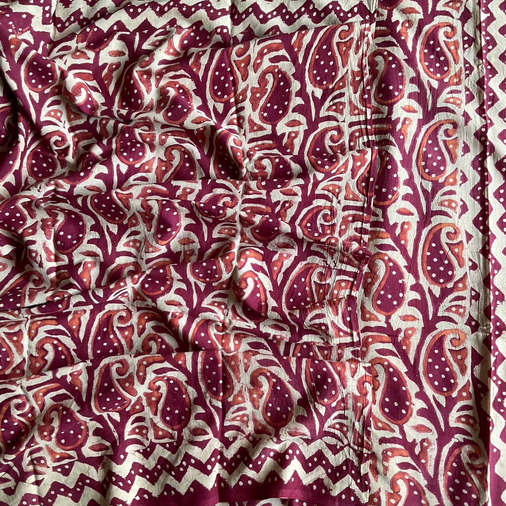 Mulmul Cotton handblock printed saree in maroon openlook.