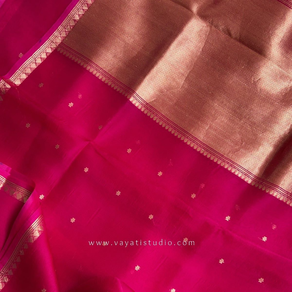 Grand brocade pallu of rani pink Kora Banarasi silk saree with Kaduva border, Vayati Studio