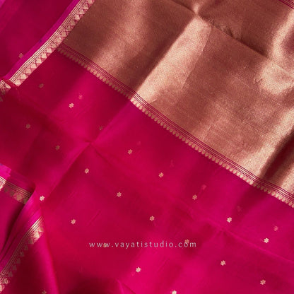Grand brocade pallu of rani pink Kora Banarasi silk saree with Kaduva border, Vayati Studio