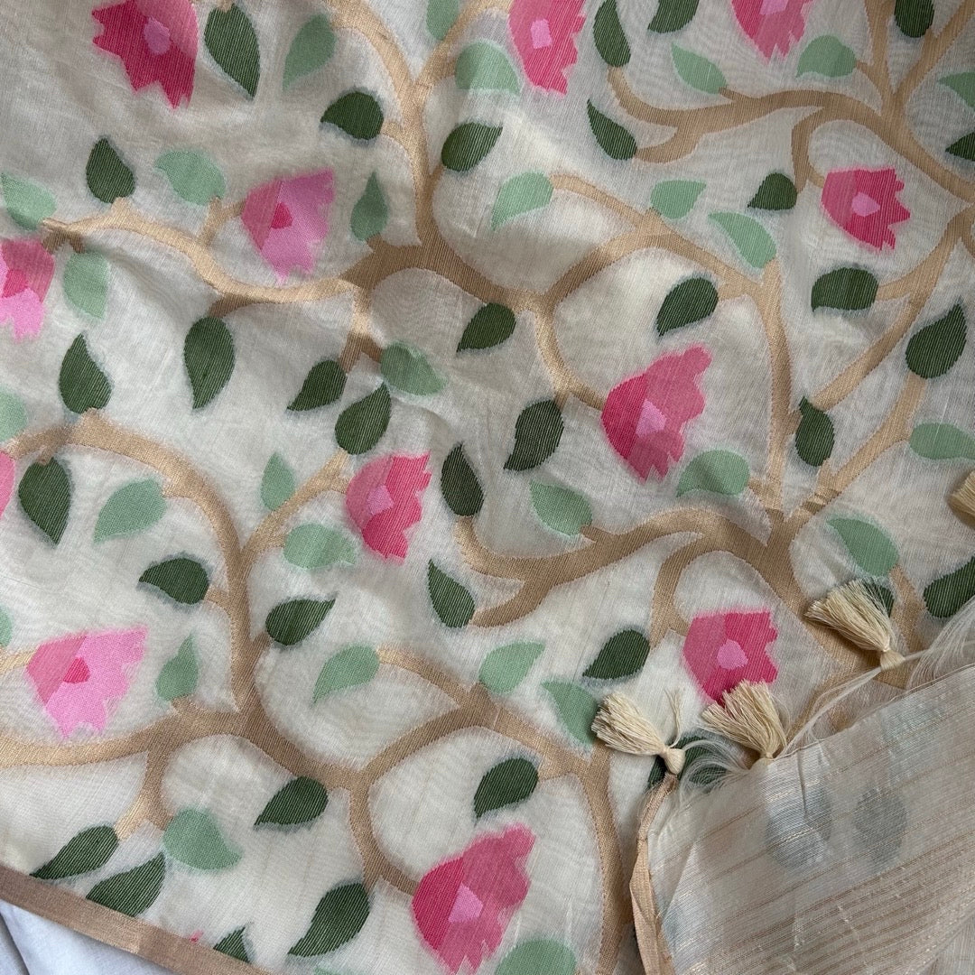 Half white semi linen woven jamdhani pallu.