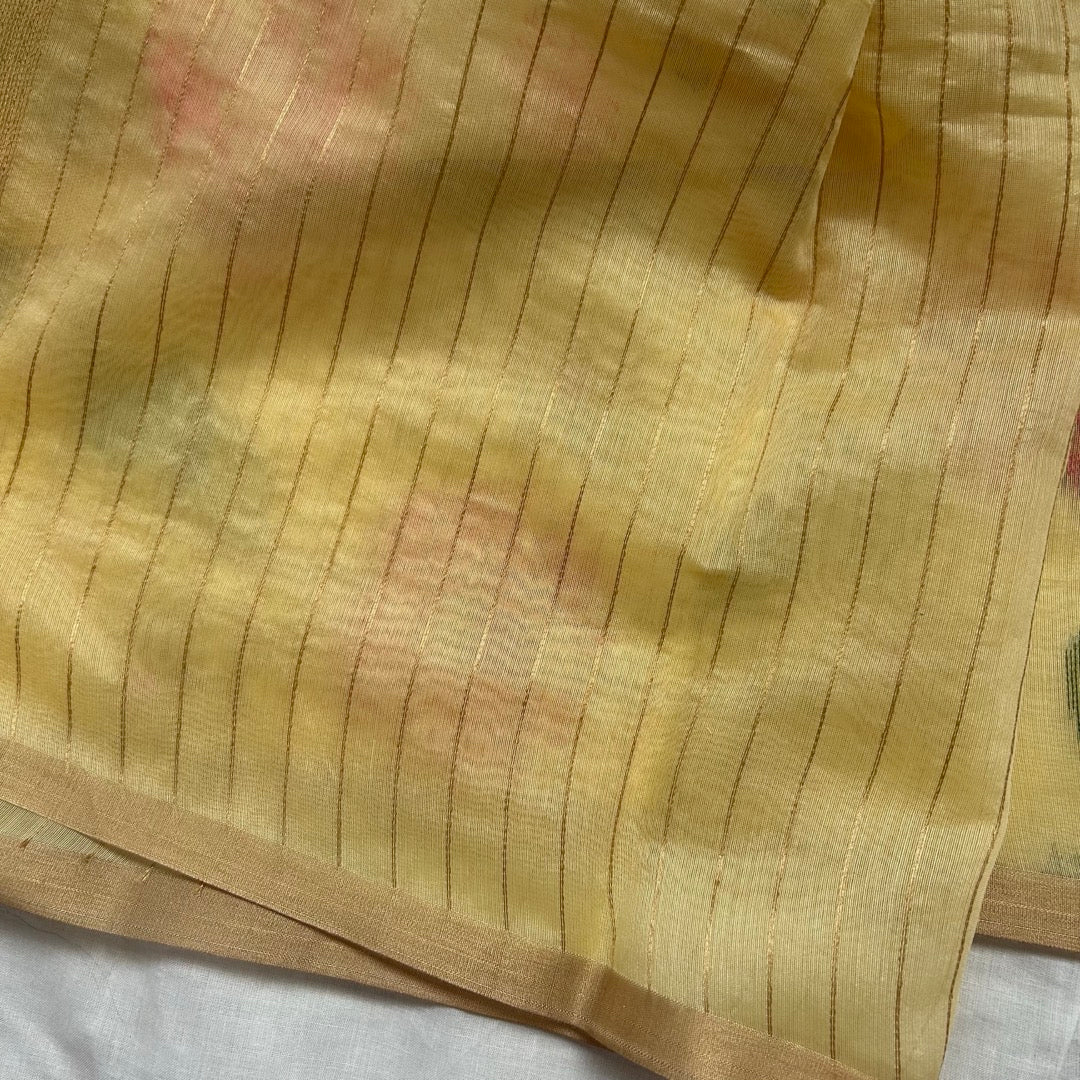 Mild yellow same linen blouse with stripes.